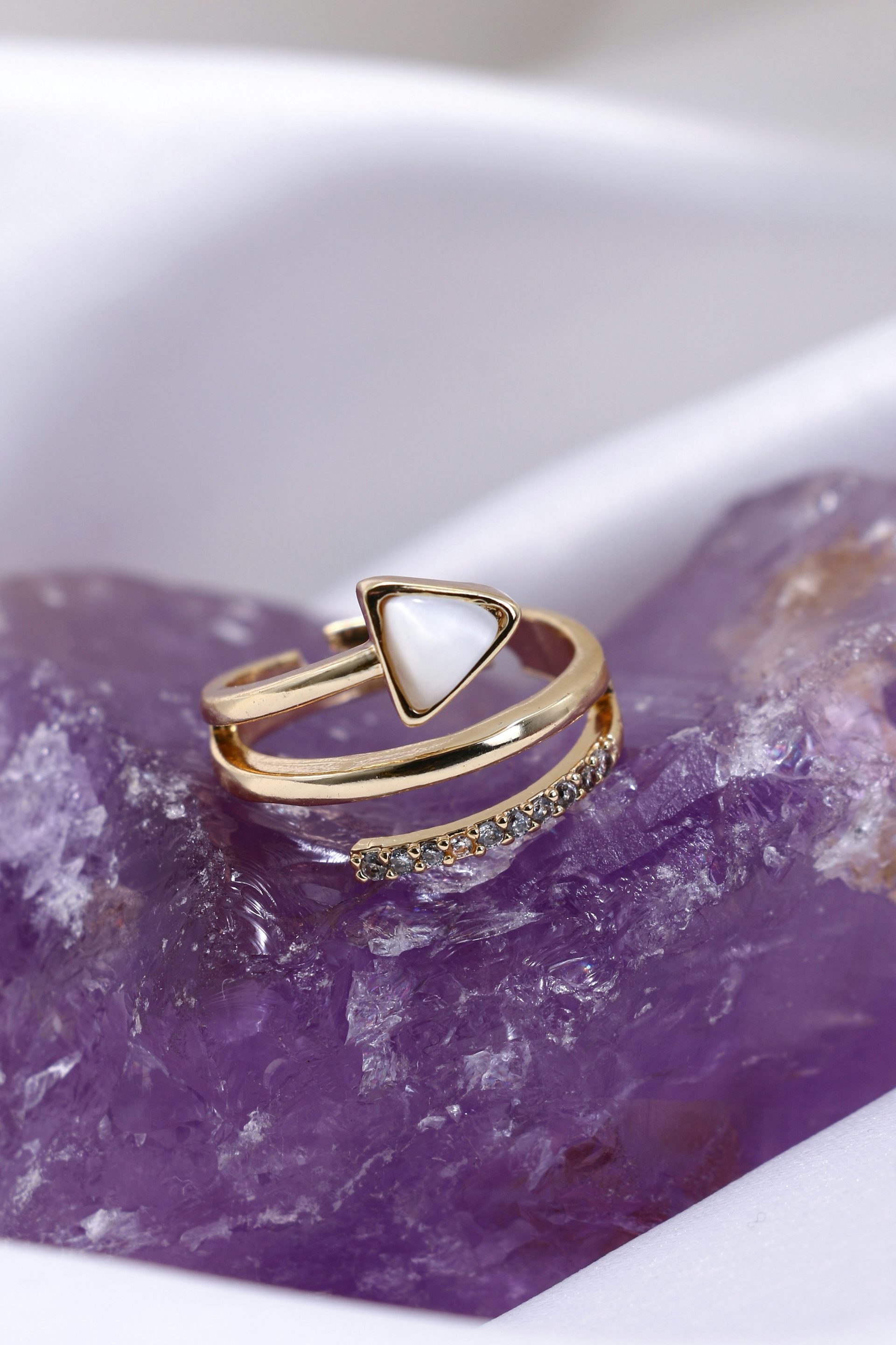 a close up of a ring on a rock